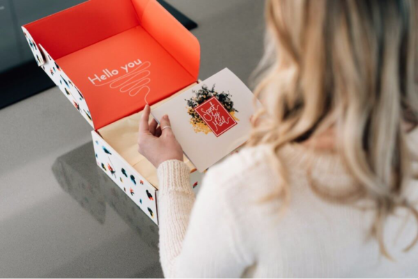Girl Unboxing Gift Box